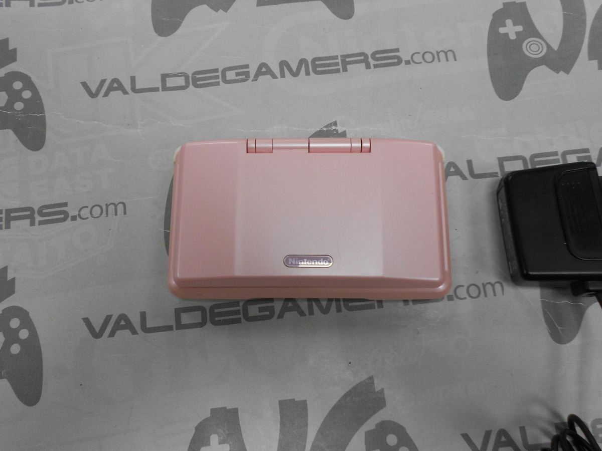 Nintendo DS Rosa cerrada con cargador